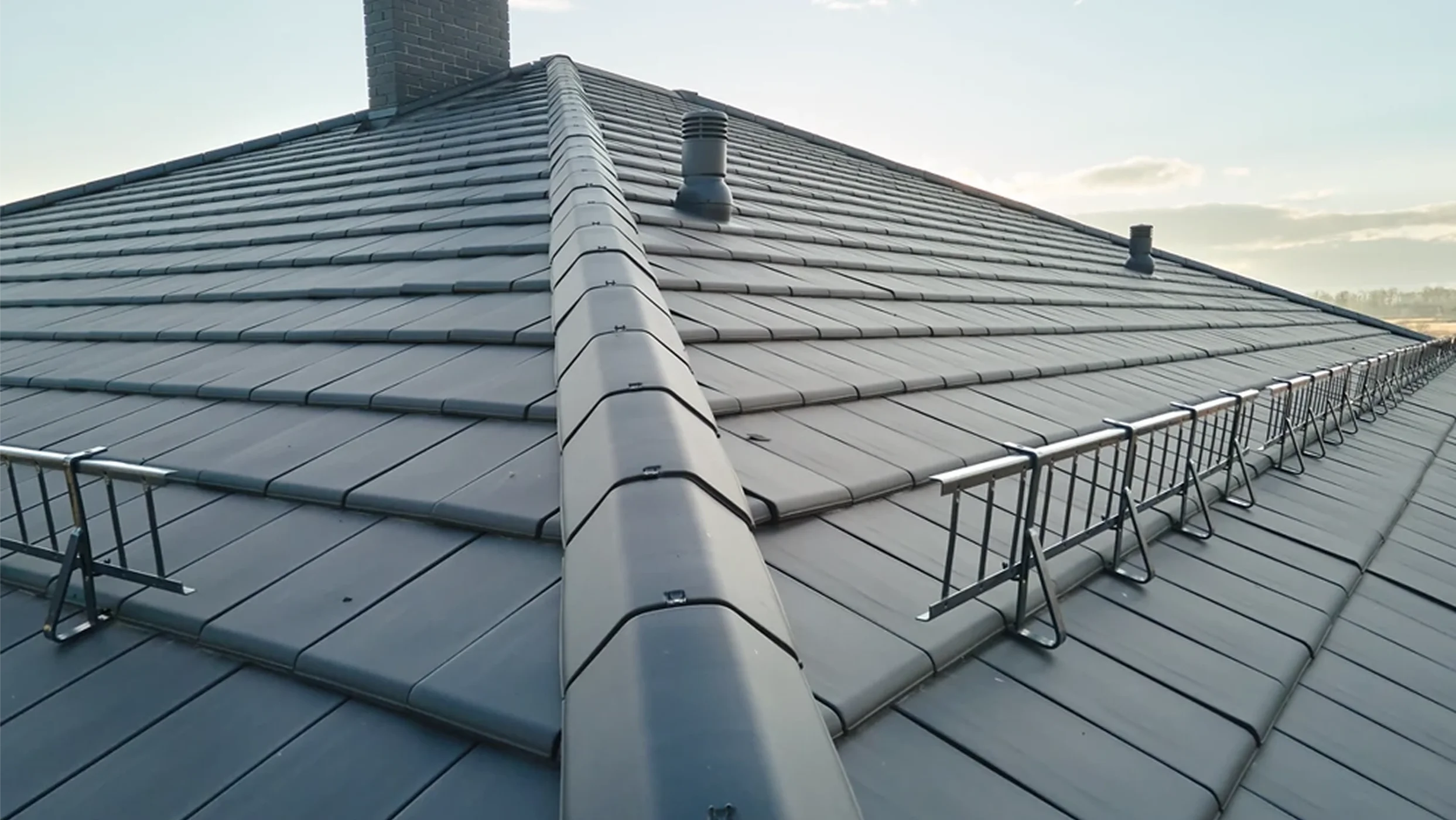 closeup-of-house-roof-top-covered-with-ceramic-shi-2026-03-16-02-33-09-utc-7 1