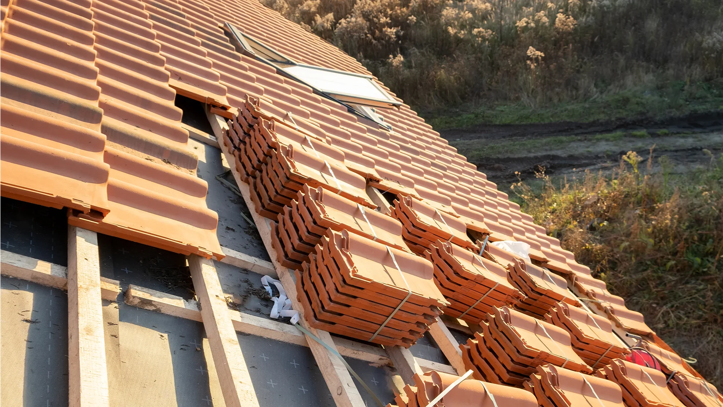 stacks-of-yellow-ceramic-roofing-tiles-for-coverin-2026-03-17-14-35-46-utc 1
